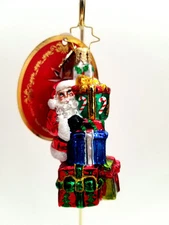 Christopher Radko - A Tower Of Tidings Gem #1020564 Santa Holding Up Presents 