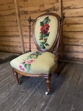 Walnut french upholstered cotton nursing chair with wheel castors