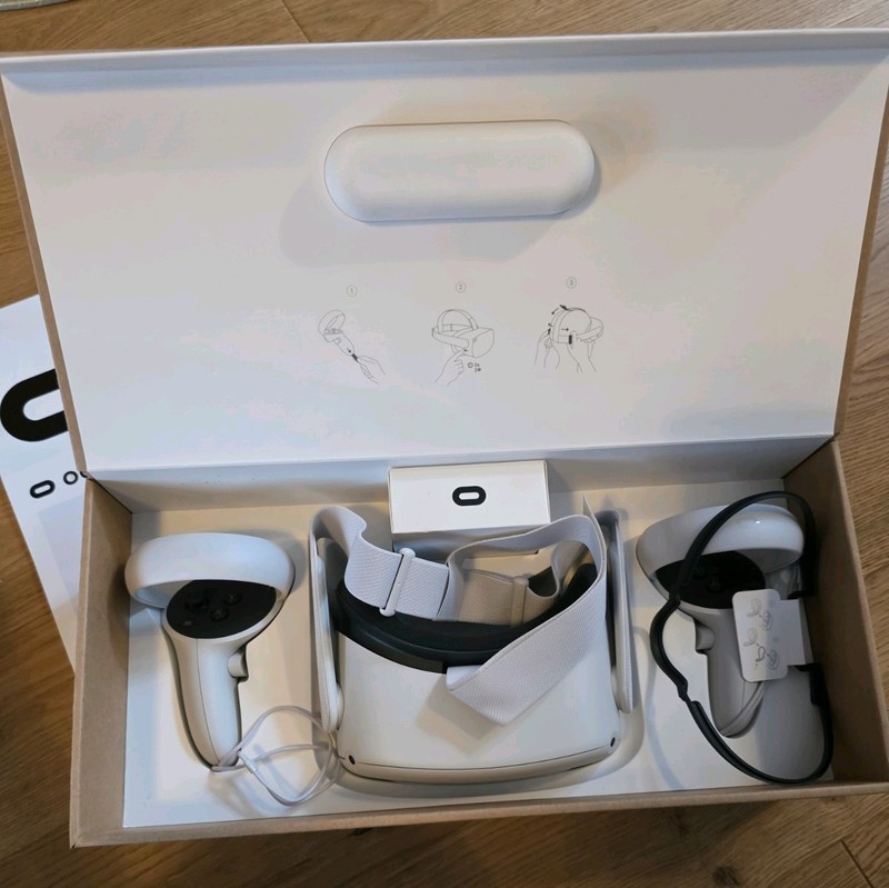 Meta quest 2. 64gb white boxed with 2 hand controls