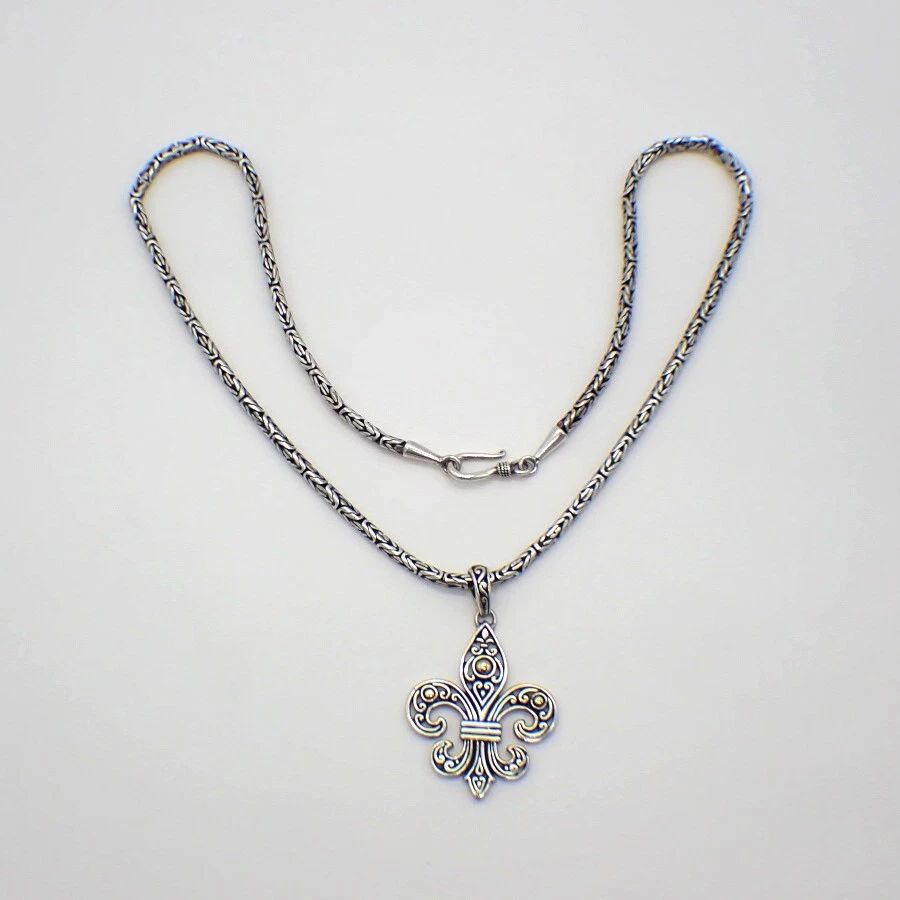 Fleur de lis on sale gold pendant
