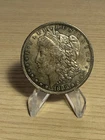 1883-O United States Morgan Silver Dollar AU Toned