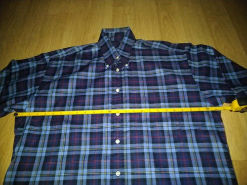Navy, red, and blue plaid Burberry London shirt size L with white buttons, made in USA on yellow measuring tape.