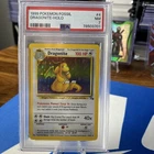 Pokémon Dragonite 4/62  1999 Fossil Holo PSA 7 NM