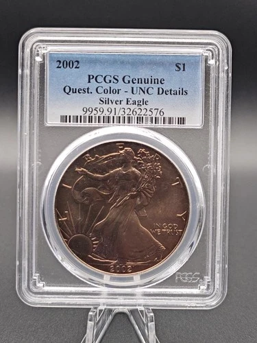 2002 American Silver Eagle – PCGS Genuine UNC Details Toned