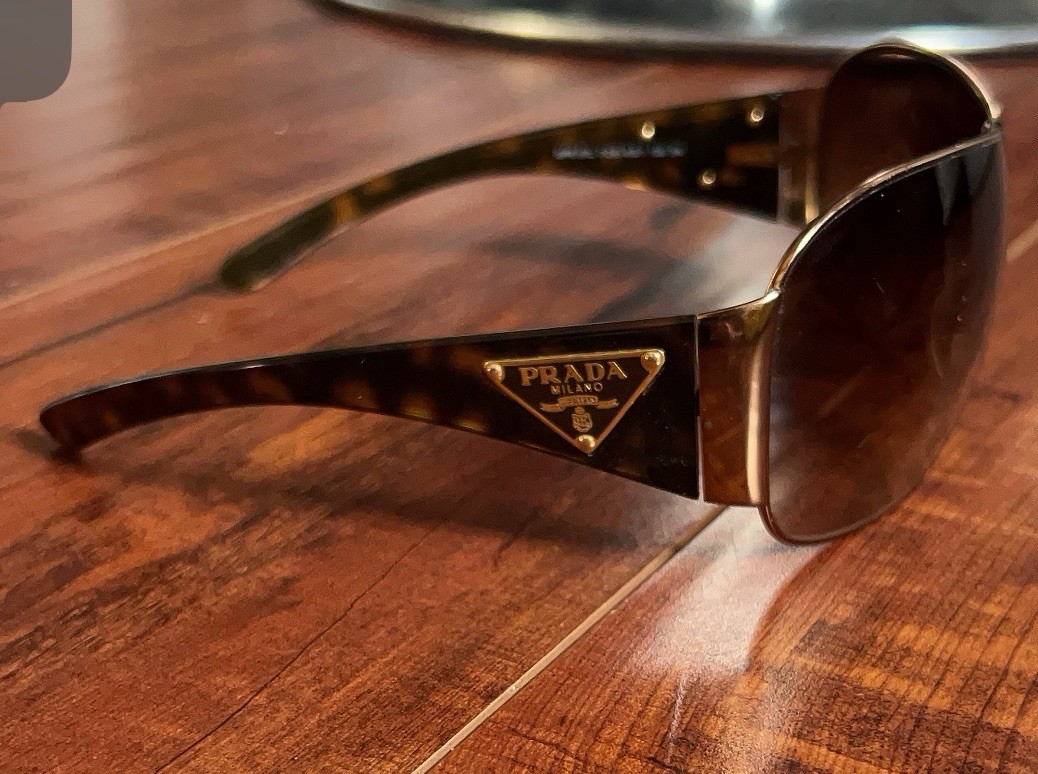 Prada Tortoise Shell Sunglasses with UV Protection and Brown Lenses