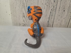 Untamed T-Rex Interactive Dinosaur by Fingerlings Scratch Orange  Wowwee 2017