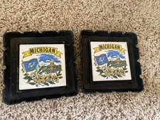 2 Vintage Black Cast Iron Novelty Decorated Tile Ashtrays Lansing Michigan