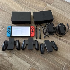Nintendo Switch Bundle-2 Consoles, 3 JoyCons, 2 Joycon Straps, Switch OLED