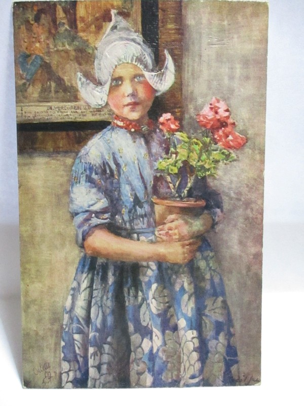 1910 RAPHAEL TUCK POSTCARD PICTORIAL HOLLAND, DUTCH GIRL HOLDING FLOWERS