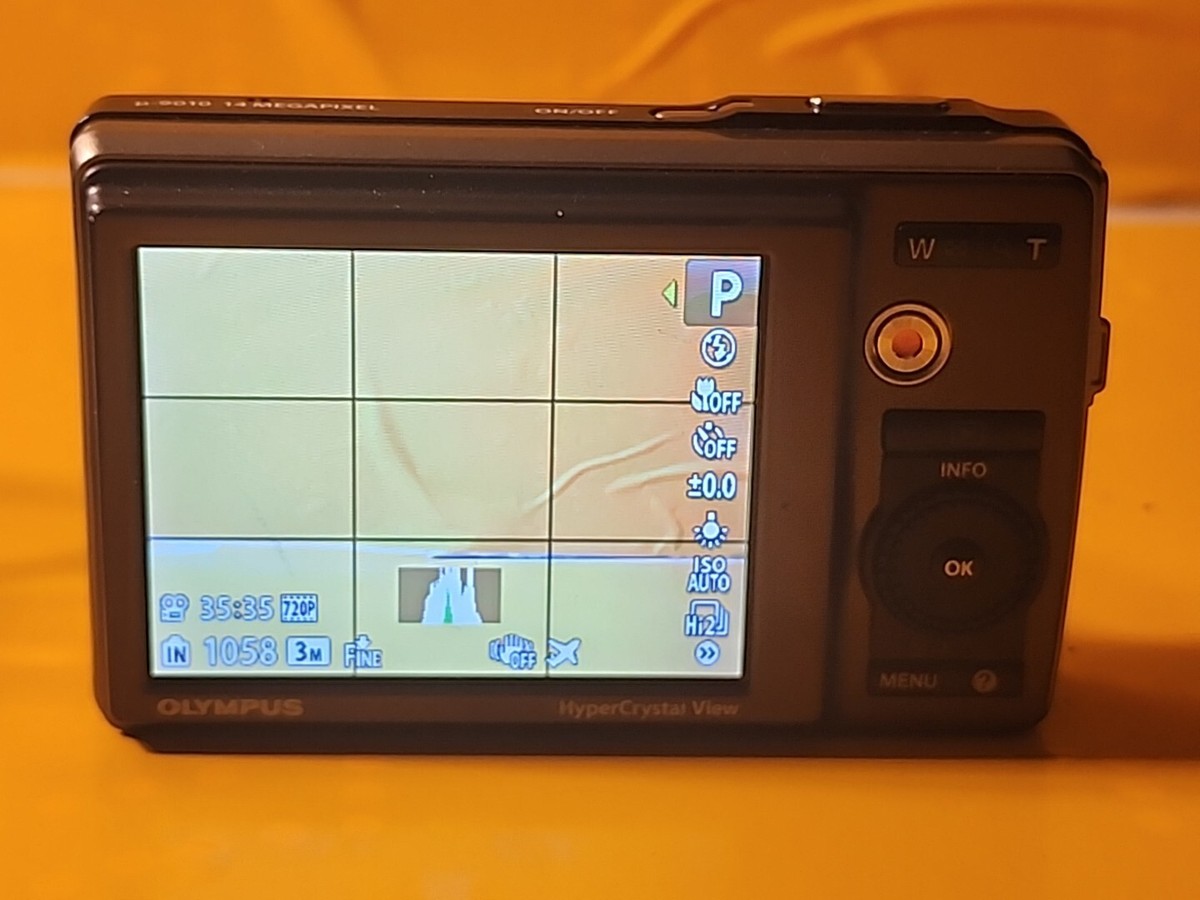 Olympus μ[mju:] 9010 Champagne Gold 14.0 MP Digital Camera READ