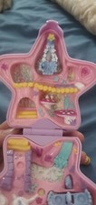 vintage 1992 polly pocket. Missing fairy. Has two other girls and seal.