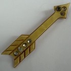 VINTAGE ART DECO CARVED CELLULOID CRYSTAL RHINESTONE ARROW BROOCH — photo 1