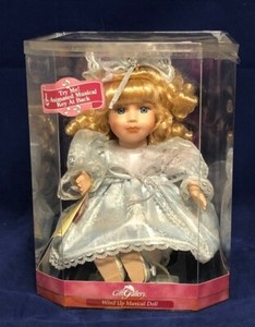 wind up musical porcelain doll