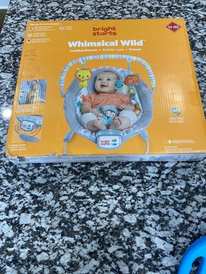 whimsical wild cradling bouncer