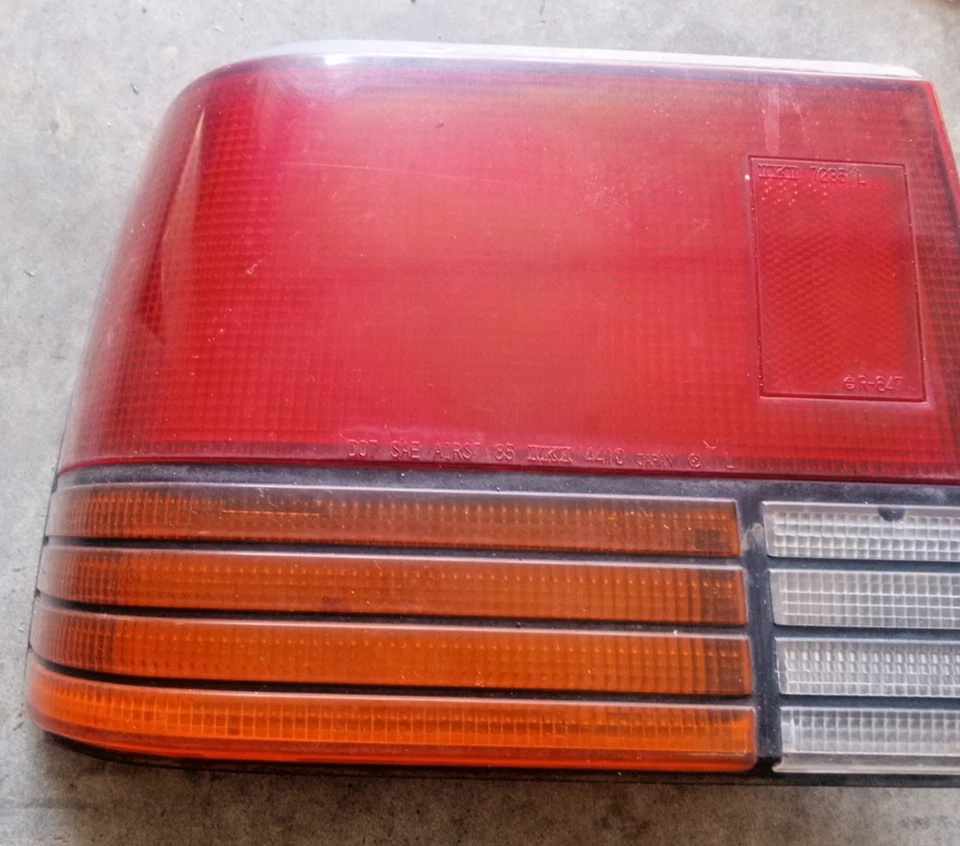 Luz trasera izquierda conductor Chevrolet Spectrum 1985-86 OEM, 166-58105A LOC-171DG Foto 3 de 4