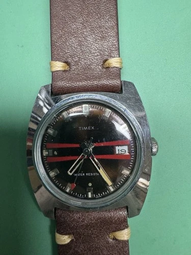 Vintage 1972 Timex burgundy dial with a horizontal red racing stripe. New Strap