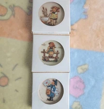 Set of 3 Attached Hummel Mini Plates, Postman, Girl on fence and Girl with Geese