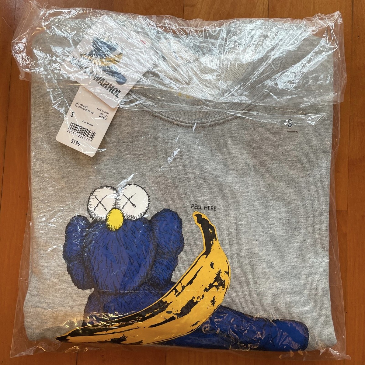 Uniqlo X KAWS X Warhol 2024 Graphic Grey Sweatshirt Brand Uniqlo X KAWS X Warhol 2024 Graphic Grey Sweatshirt Brand