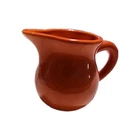 Harlequin Individual Creamer in Orange Pitcher Homer Laughlin Fiesta