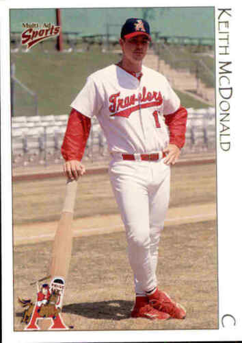 1999 Arkansas Travelers Multi-Ad #18 Keith McDonald Yokosuka Japan Baseball Card - Afbeelding 1 van 2