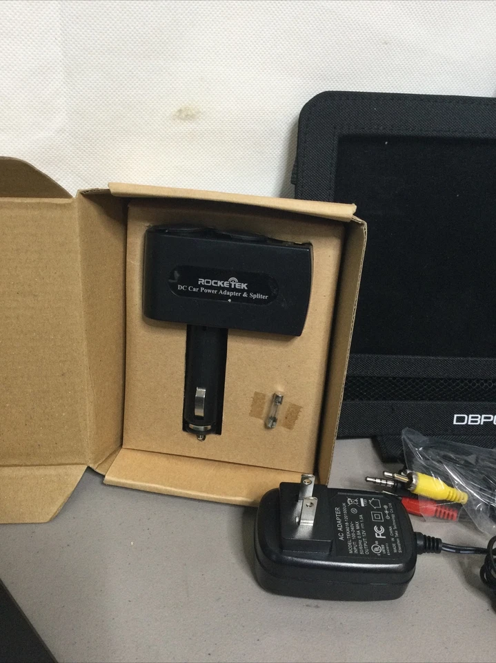 DBPower Model SY-03 10" Portable DVD Player With Remote, Cables And Accessory’s. - Image 3 of 4