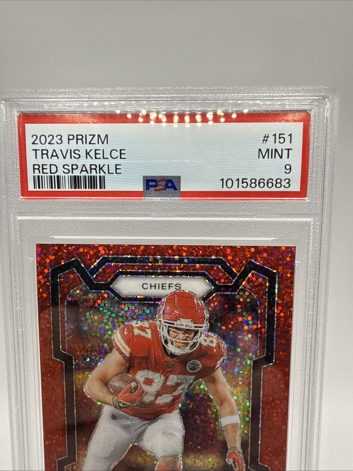 2023 Panini Prizm Travis Kelce Red Sparkle SSP Chiefs #151 PSA 9 view 2