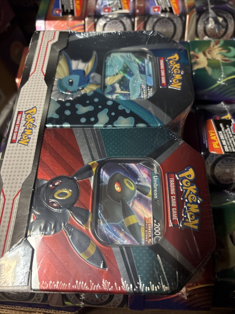 pokmon trading card game: vaporeon umbreon tin bundle Pokemon or the gracious gifts of Sylveon V Pokemon TCG V Heroes Bundle