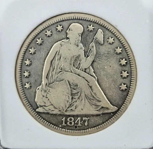 1847  SEATED LIBERTY DOLLAR. Well detailed - natural look.