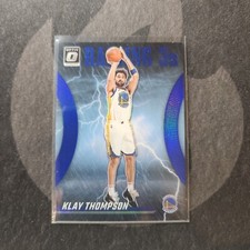 2023-24 Panini Donruss Optic Klay Thompson Raining 3s Blue Prizm /49 #7 Warriors
