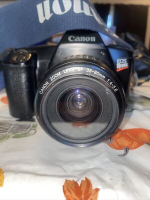 Canon EOS Rebel Camera - Black - with 35-80mm lens & 52mm UV Lens Read Descrip