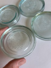 Set of Four Vintage Aqua Mason jar lids