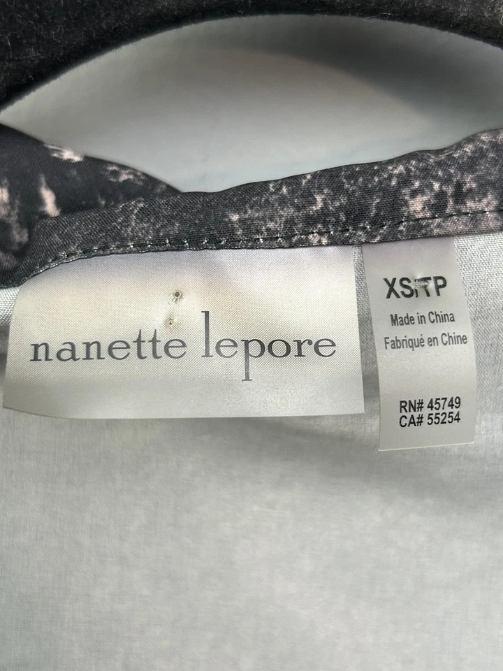 Chaleco Nanette Lepore para mujer XS negro blanco con capucha cremallera completa sin mangas atlético Foto 4 de 4