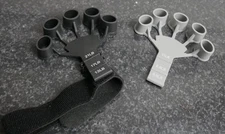 Hand and Finger 5 Grip Strengthener Finger Exerciser Therapy Grip Wrist Guitar