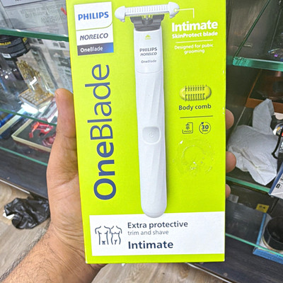 Philips Norelco OneBlade Intimate Trimmer, SkinProtect Body Comb, USB Recharge