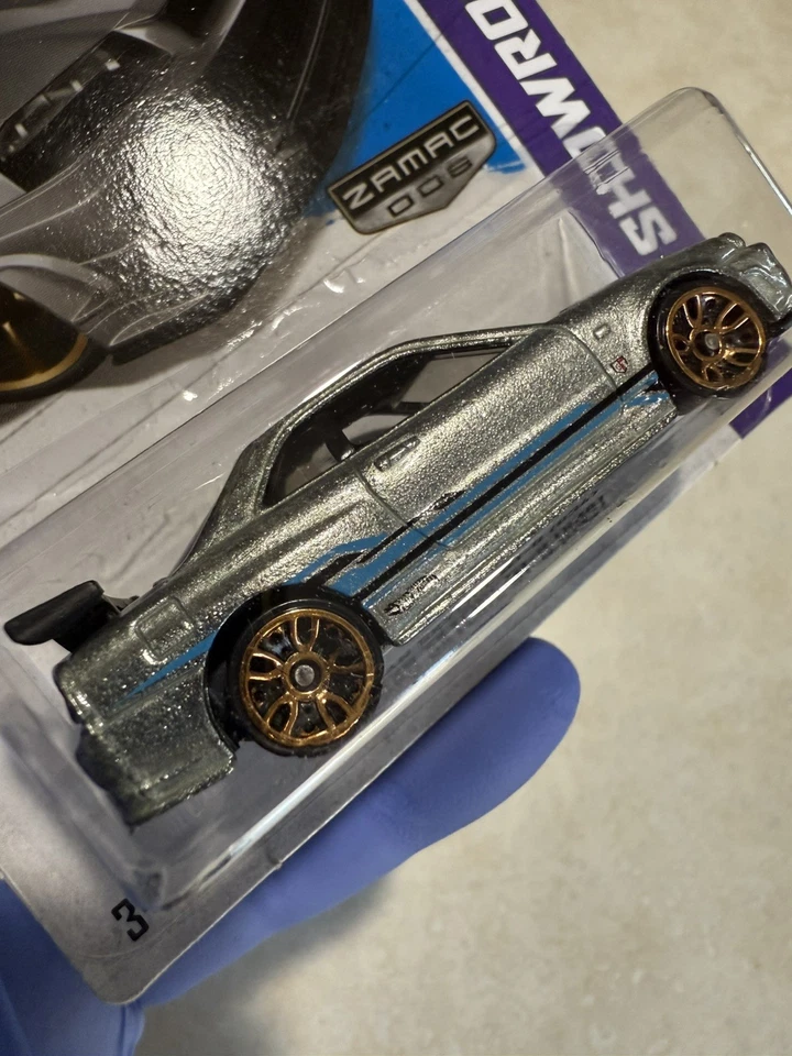 Hot Wheels 2013 HW Showroom Nissan Skyline GT-R R34 in Zamac - Gold J5's MOC!🔥 - Image 2 of 3