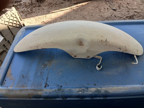 Older. Front fender for harley Davidson motor cycle color is white