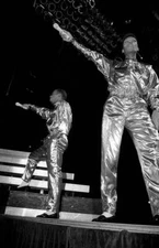 Michael Bivins and Ronnie Devoe of New Edition performs at the Me- 1988 Photo 1
