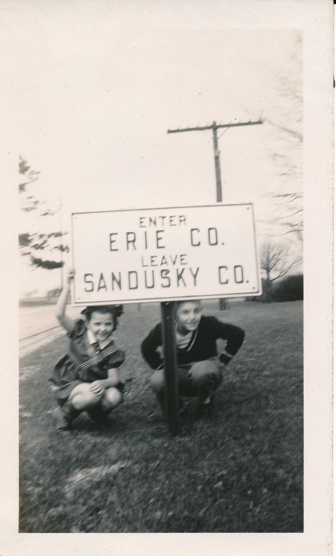 vintage snapshot photo: Roadside Erie Sandusky Ohio County Road Sign Boy Girl