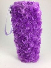 PURPLE FUR NOVELTY BAG WITH ZIPPER INCLUDES 32 RUBBER BRACELETS VARIOUS SHAPES