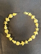 Gorgeous 10k Solid Gold Seashell Fish Starfish Bracelet. 7.3”. 6.6 grams. 