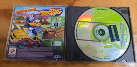 The Grinch (Sega Dreamcast, 2000) Cover art and manual.