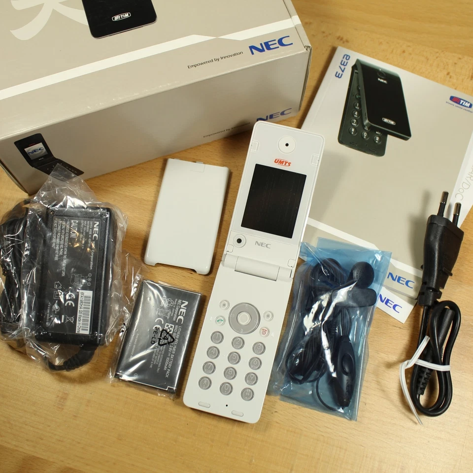 罕见老式NEC e373白色翻盖手机国际带盒收藏品完整 — 第 2/4 张图片