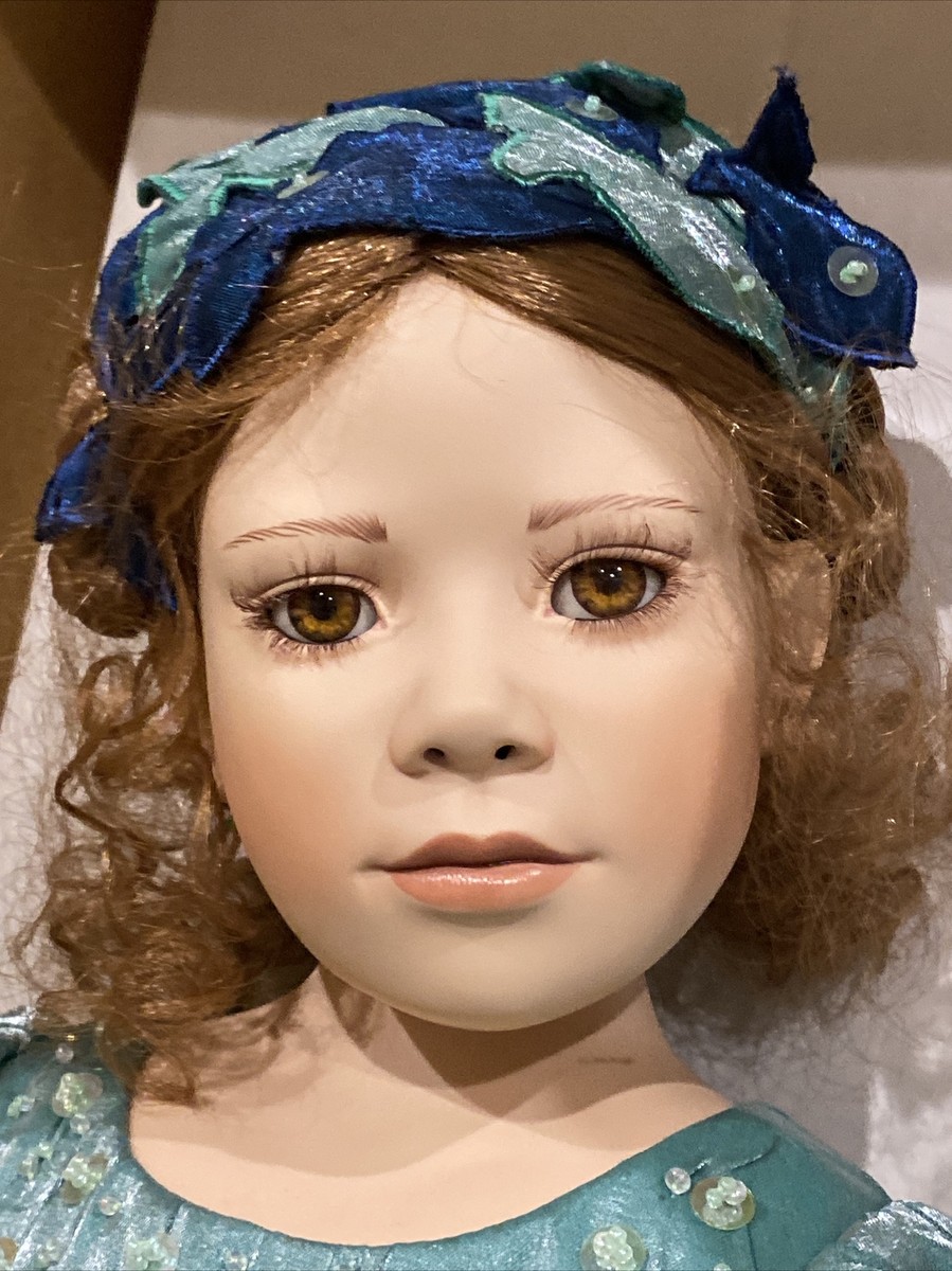 Poupée d'artiste Christine orange en porcelaine 75 cm. sale