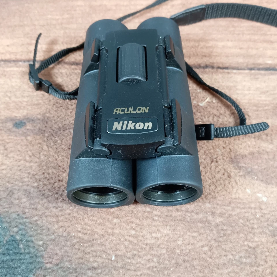 Бинокль Nikon Aculon A30 10x25 черный широкоугольный - Изображение 3 из 4