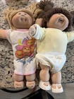 Cabbage Patch Dolls One With Green Eyes, One With Blue Eyes