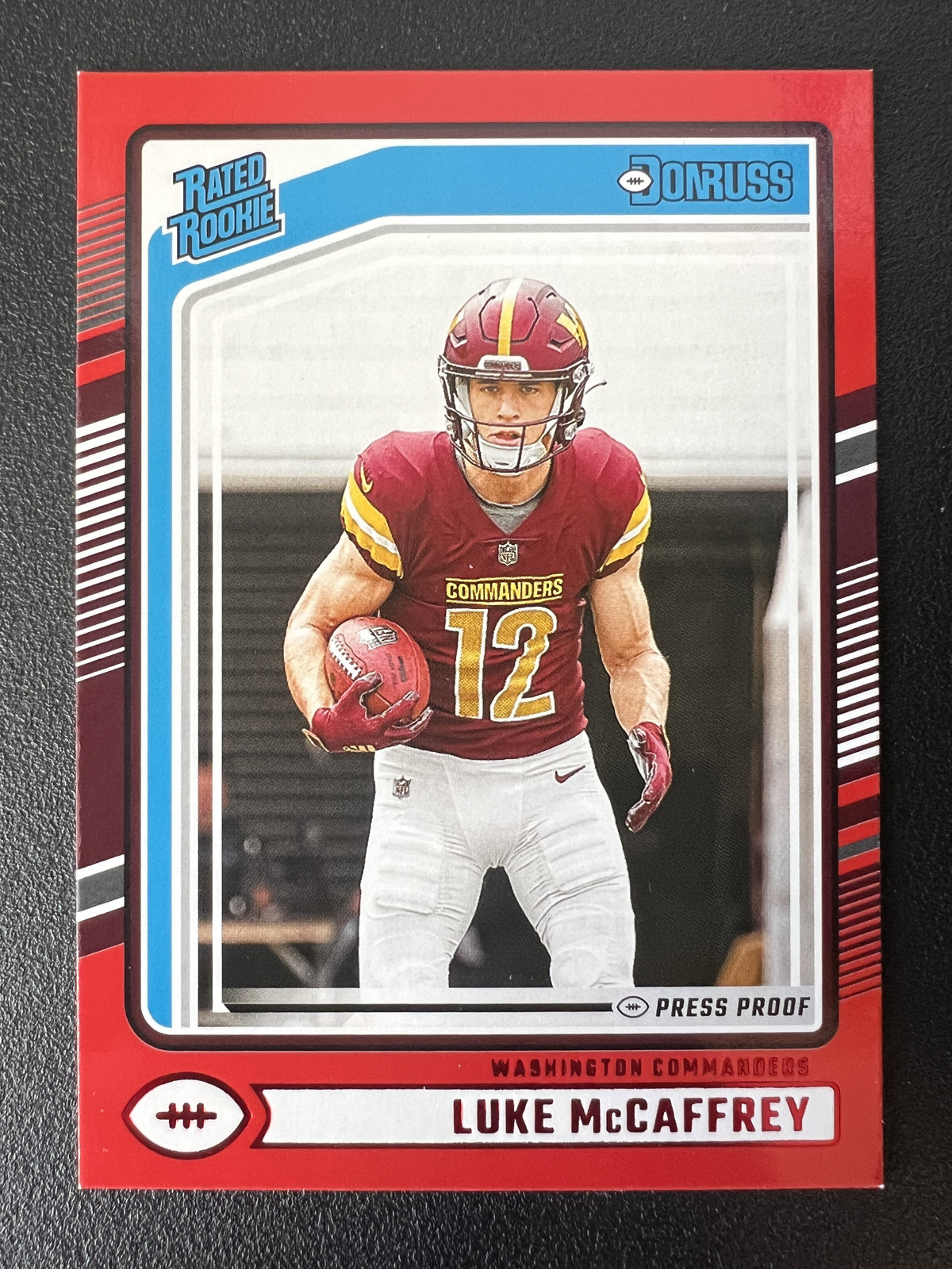 Luke McCaffrey 2024 Donruss #302 Press Proof Red Rookie