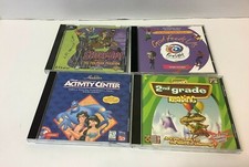 Lot of 4 Children's CD-ROM PC Games Aladdin Scooby Doo 2nd Grade Reading Bible