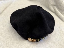 Vintage black French beret embellished with cluster of miniature ribbon flowers