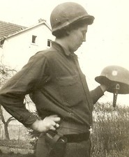 SOUVENIR! Helmeted US Soldier Looking Over Captured German WaffenPolizei Helmet!