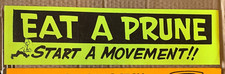 EAT A PRUNE VINTAGE 1970's VINYL DECAL BUMPER STICKER -Yellow, 4"x 15"